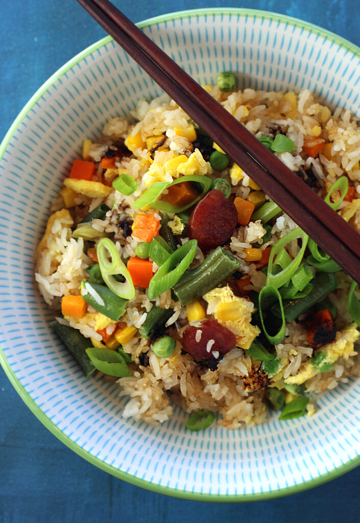 Use your oven and a preheated sheet pan for the crispiest fried rice you'll ever enjoy.