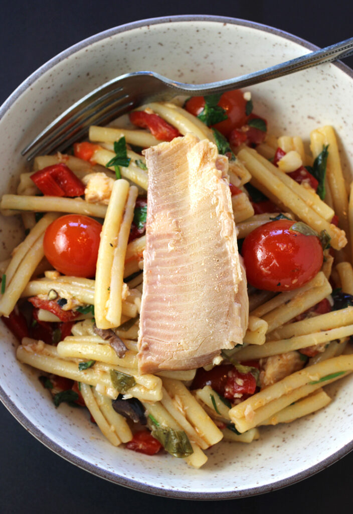 Tender, lightly smoked Safe Catch trout fillets make a great addition to pasta.