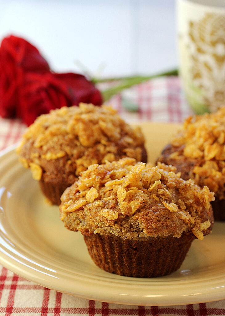 A crunchy corn-flake streusel tops these delicious banana bread muffins.