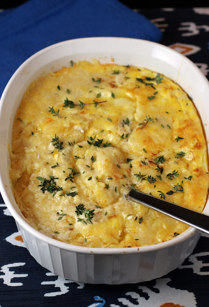 Polenta turns extra rich and creamy when baked with sour cream and beaten eggs.